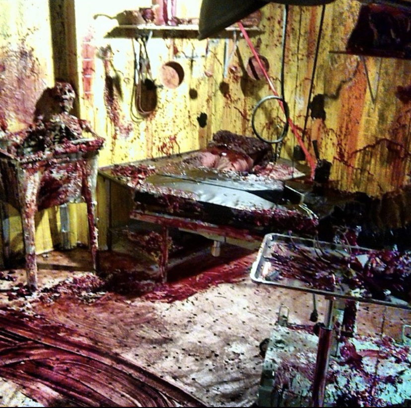 scary murder scene room in haunted house scenic design by Chris Russell